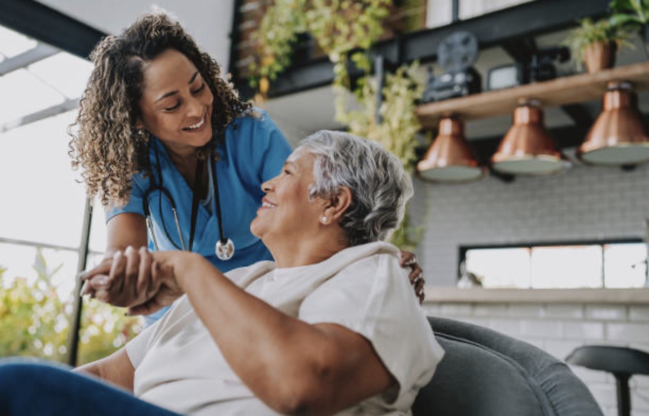 Caregiver providing personal care support at home